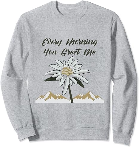 A sweatshirt with a flower and mountains Description automatically generated