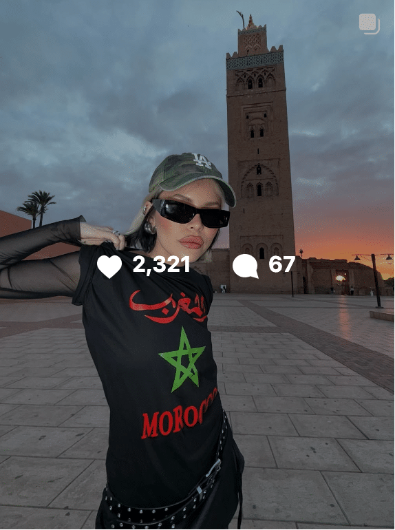 A person posing for a picture Description automatically generated