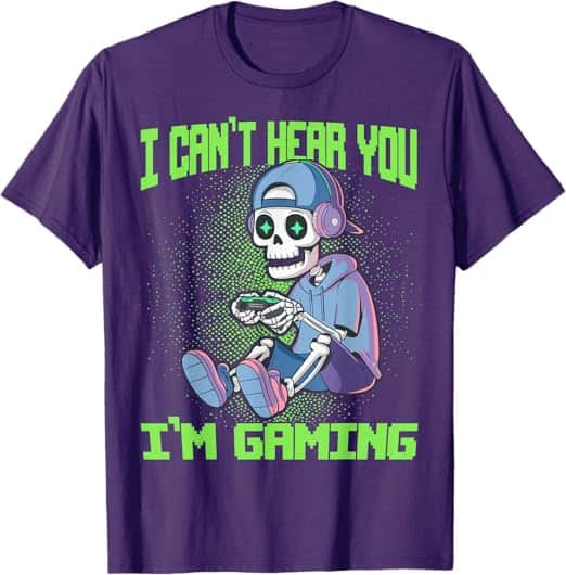 A purple t-shirt with a cartoon skeleton playing a video game Description automatically generated