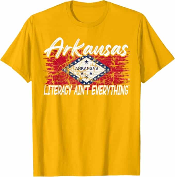 A yellow t-shirt with a flag and text Description automatically generated