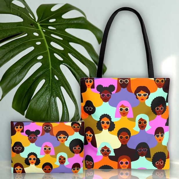 May include: A tote bag and a smaller pouch with a colorful pattern of women wearing glasses. The pattern is a mix of pink, orange, yellow, blue, green, and brown. The women have different hairstyles and skin tones.