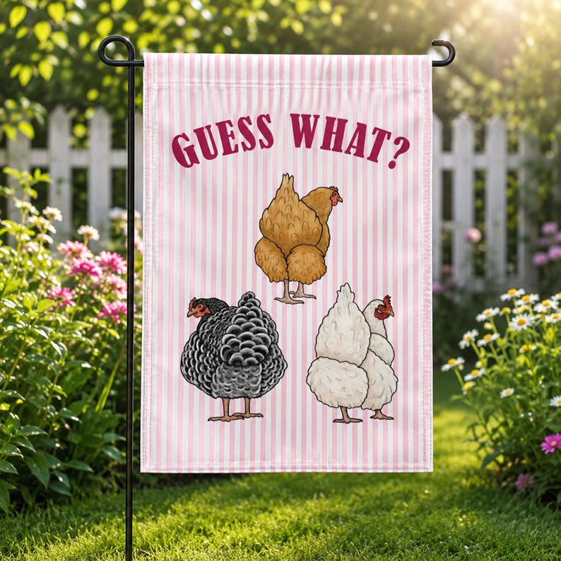 A garden flag with chickens on it Description automatically generated